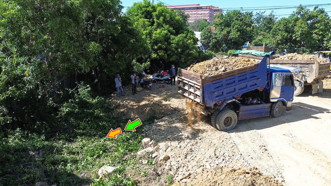 Wonderful skill filling up land and clear off trees by Komatsu D21 Dozer