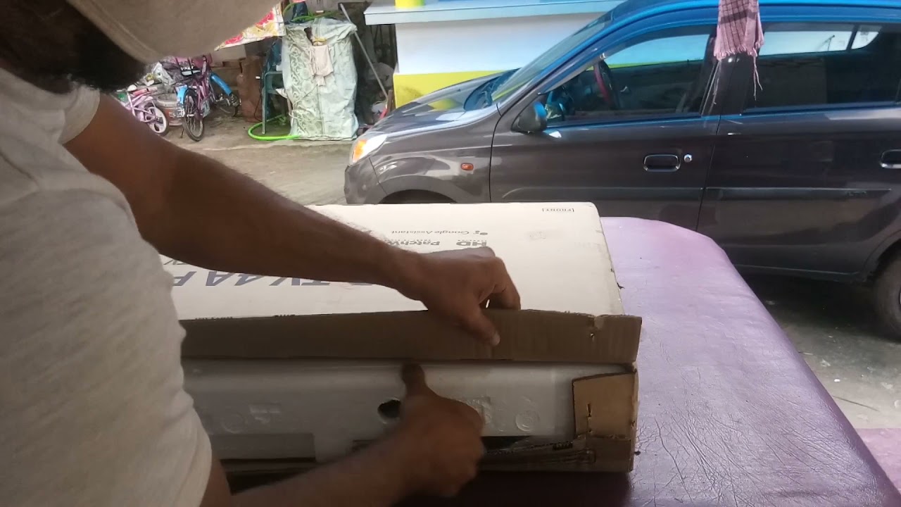 Unboxing Mi android LED 32'' smart Tv  with my brother