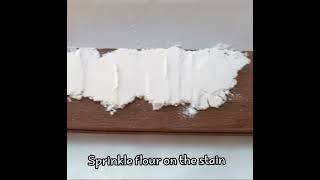 The best way to remove a stain from boiled linseed oil from WPC cladding sheet after 30 hours 