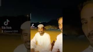 الشاعر عبيدالله القارحي مع السوداني صاحب كراتيه 