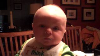 Aubrey eating from a spoon for the first time