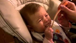 Haley tries Gerber rice cereal
