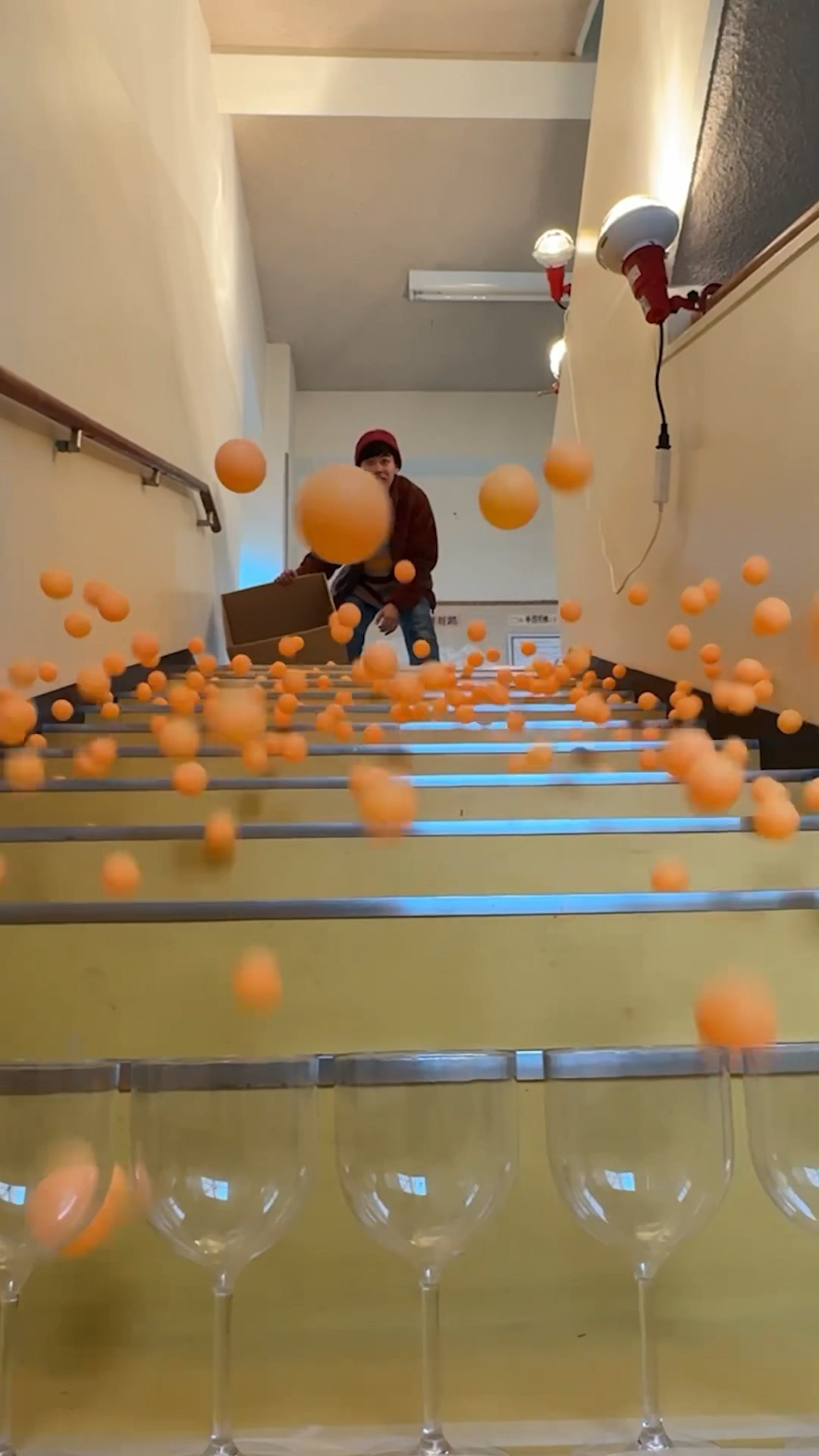 Toss 500 ping pong balls into the glasses! #shorts
