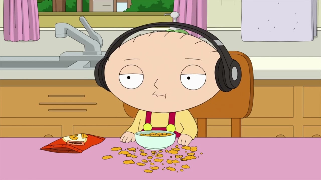 Stewie ignores Lois and puts on headphones  