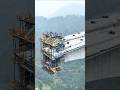 Tower Cranes Towering Over a High Bridge Build