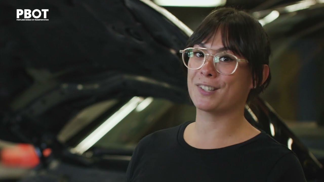 How parking management is like... a mechanic inspecting a car.
