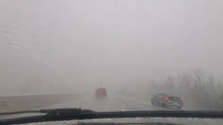 Brave storm chasers drive straight through the core of a supercell swirling in Missouri
