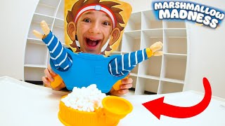father son play marshmallow madness who eats most