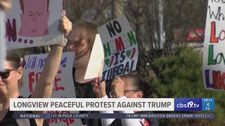 Group gathers in Longview for peaceful protest against Trump's policies