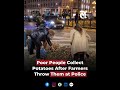 Poor People Collect Potatoes After Farmers Throw Them at Police