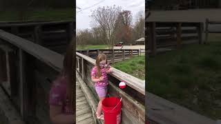 Young Daughter out fishes Dad