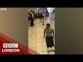 Paraplegic man drags himself through airport - BBC London