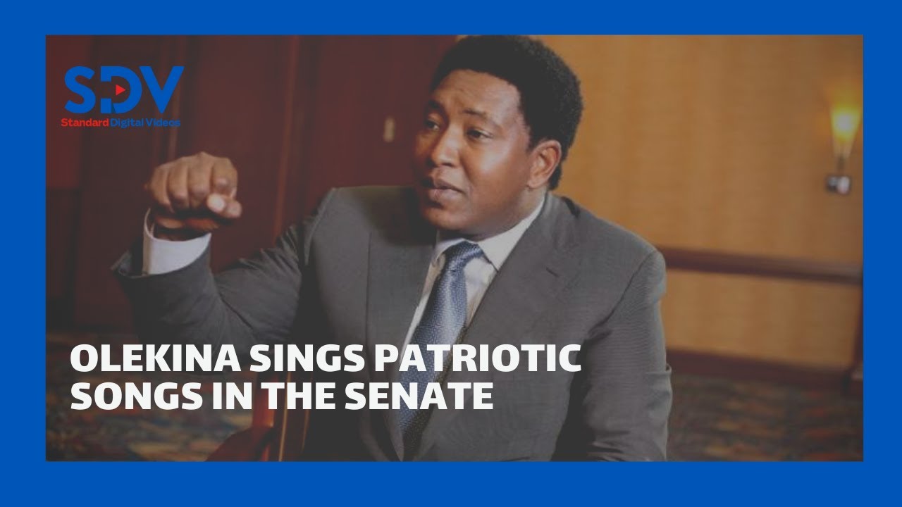 Olekina leads fellow senators in a song after the senate failed to agree on revenue sharing formula