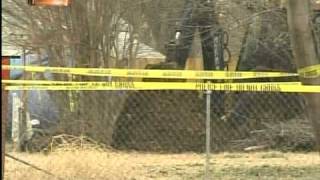 Investigators return to recover woman's remains Content