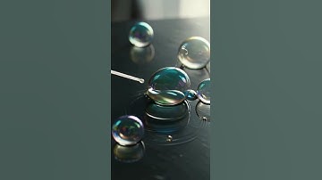 Translucent soap bubbles being gently popped in cinematic slow-motion.