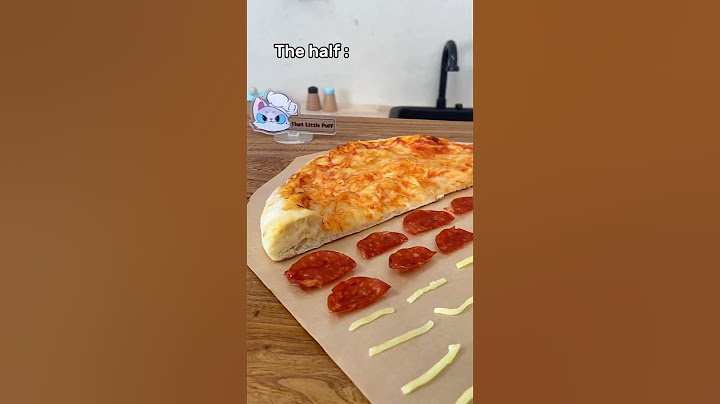 😅 Puff’s interpretation of saving half—half a bite from everything! 🍪🍕 🤣 #ThatLittlePuff