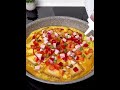 Simple bread pizza topped with melted cheese and fresh veggies #popular #pizza #food #foodie #cheese