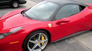 Installation of a matte black vinyl roof wrap on ferrari 458 italia at
city graphics in san diego.