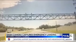 Plane landing on Escambia County interstate caught on dash camera footage