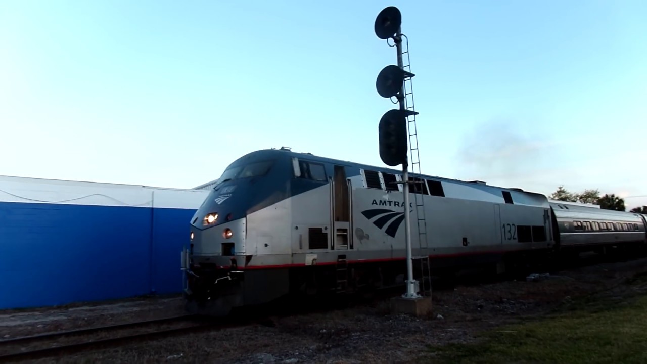 Train Reverse Amtrak Train Ready To Reverse Car Goes Around Gates - YouTube