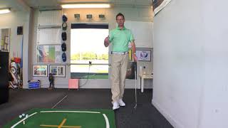 Tap the wall for a better backswing