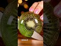cutting a kiwi into two | Smooth cut 🥝 | #fruitart #aivideo #oddlysatisfying #gardening #creative