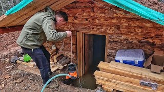 The dugout is flooded, the water is still coming! Pumping out the water! Overnight in a log cabin