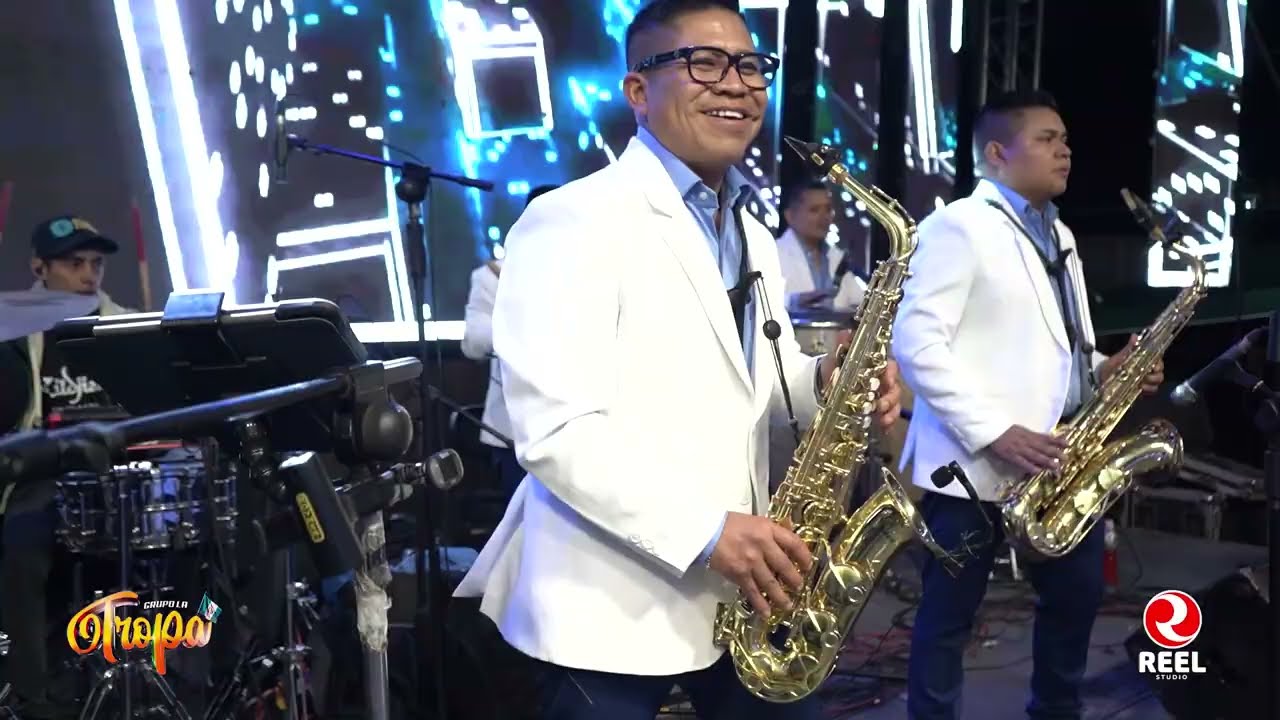 Grupo La Tropa - Al Ritmo de La Lluvia / La Llamada