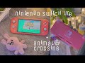 i finally gave in to switch lite! | unboxing + intro to animal crossing 🦝