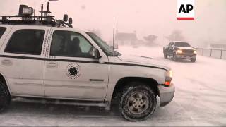 A late spring storm brought high winds and snow across portions of Massachusetts and eastern Maine o