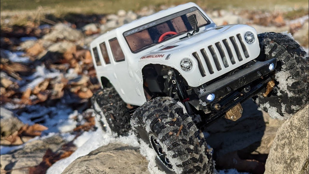 $100 Scx24 vs $250 Scx24 Climbing Snowy Rocks