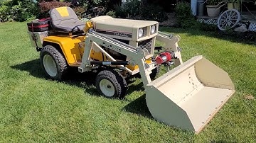 CUB CADET 129 WITH HOMEMADE FRONT END LOADER
