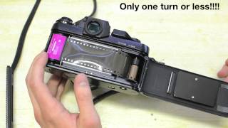 How to load a 35mm camera (SLR)