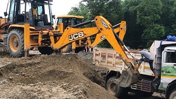 JCB Backhoe Loading on Mixed Ballast Tipper in Crusher Industry