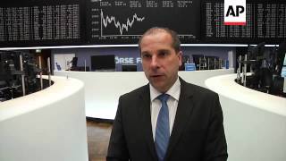 Low take up of Greek bonds; Merkel firm on debt