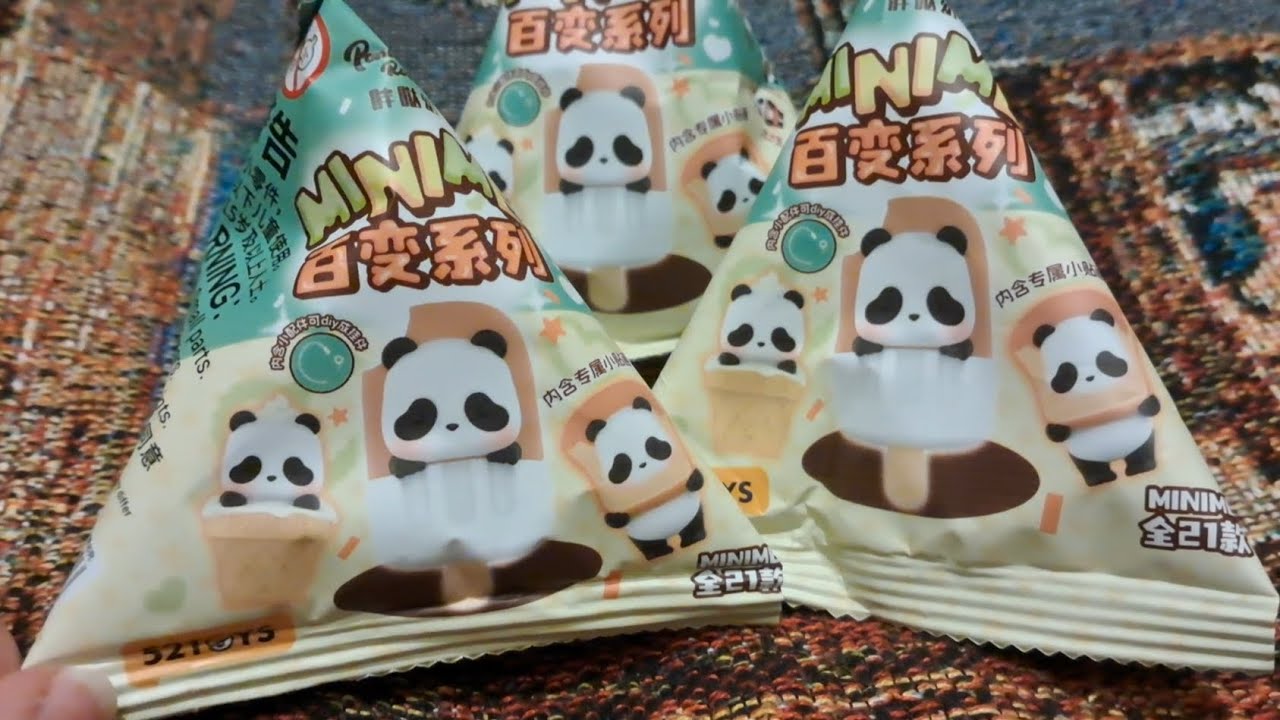 Opening Panda Roll MiniMe mini figures by 52Toys