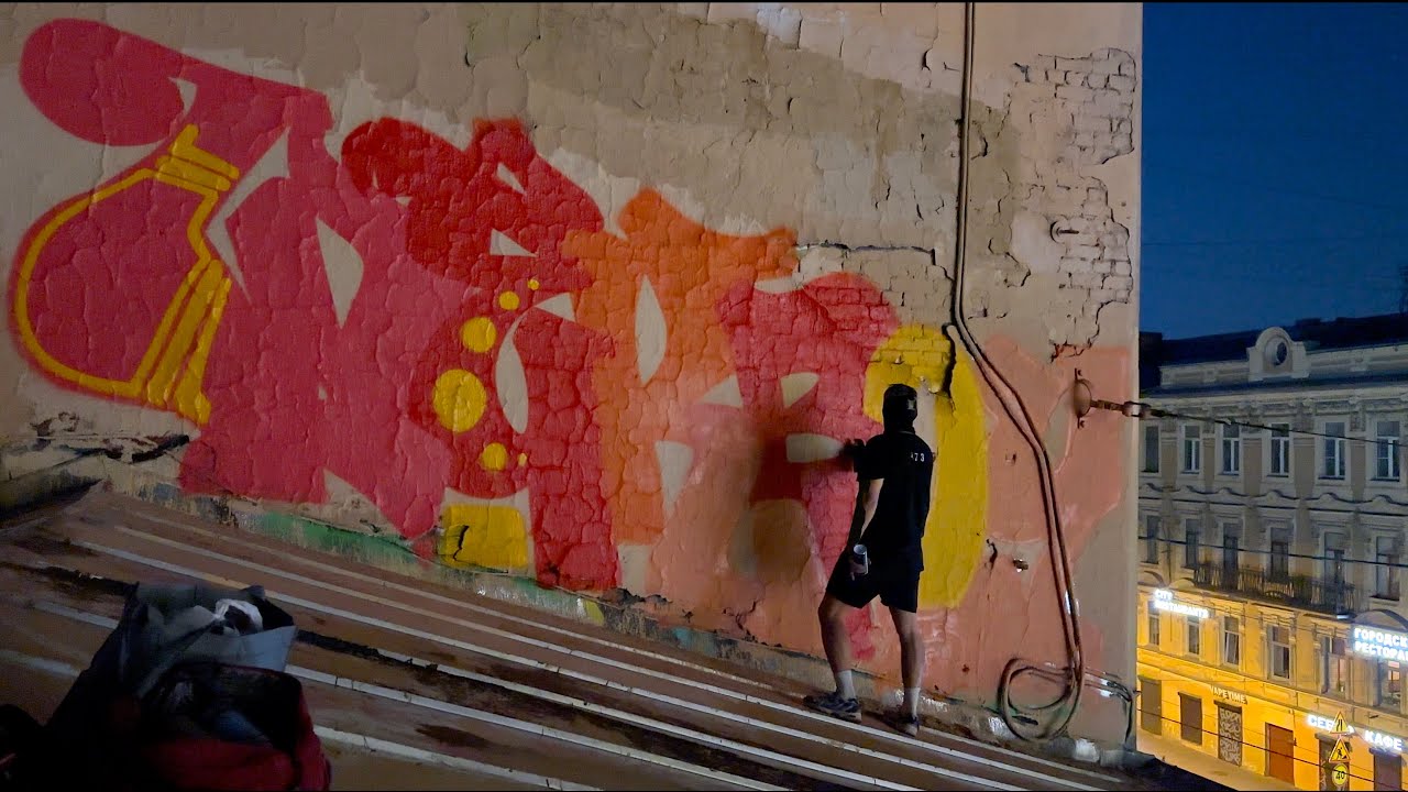 Rooftop Walker .Bright graffiti