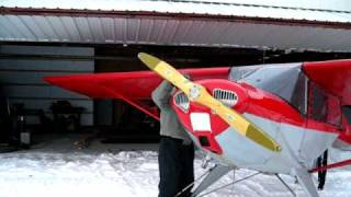 starting  my T-craft on skis.AVI