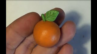 Апельсин из пластилина