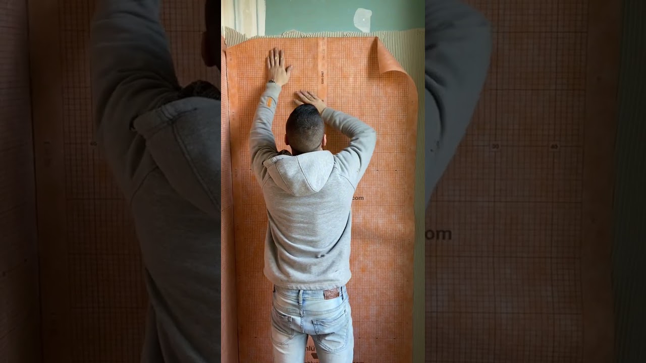 Réalisation de l'étanchéité d'une douche avec Schlüter-KERDI
