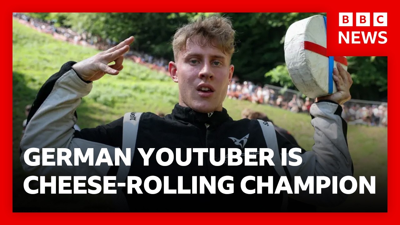 dozens of competitors chasing a wheel of double Gloucester cheese down a notoriously steep hill