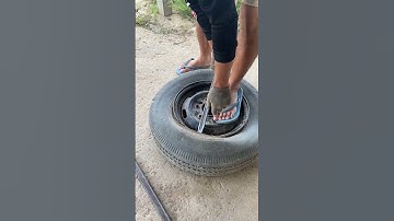 How to put a tire on the rim without machine.Tire installation struggles.  #skills #video #shorts