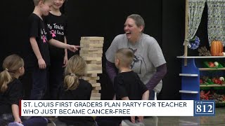 First graders celebrate teacher beating cancer
