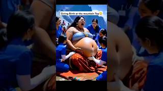 Giving Birth To Twins At The Mountain Top During Spring Holiday