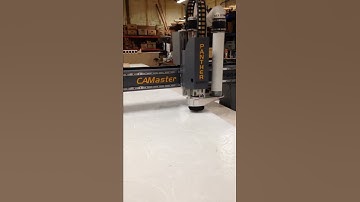 Camaster Panther CNC cutting 2" UHMW plastic in two passes