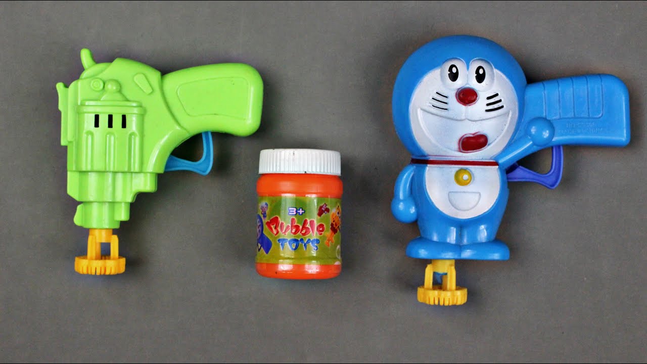 Learning Names & Colors with Bubbles for kids! Box of Doraemon Bubble Gun Toy for children YouTube