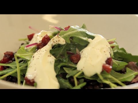 Warm black lentil salad with crispy salami and whipped sour cream, from the video