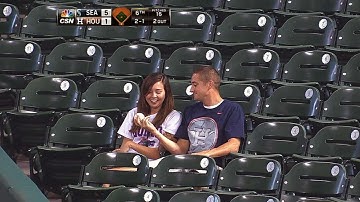 Fan makes catch to save girlfriend from foul ball