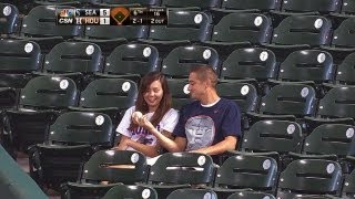 Fan makes catch to save girlfriend from foul ball screenshot 5