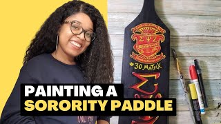 Painting a custom sorority paddle with acrylics
